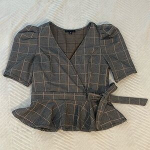 Haute Monde peplum top, black and white with a bit of pink